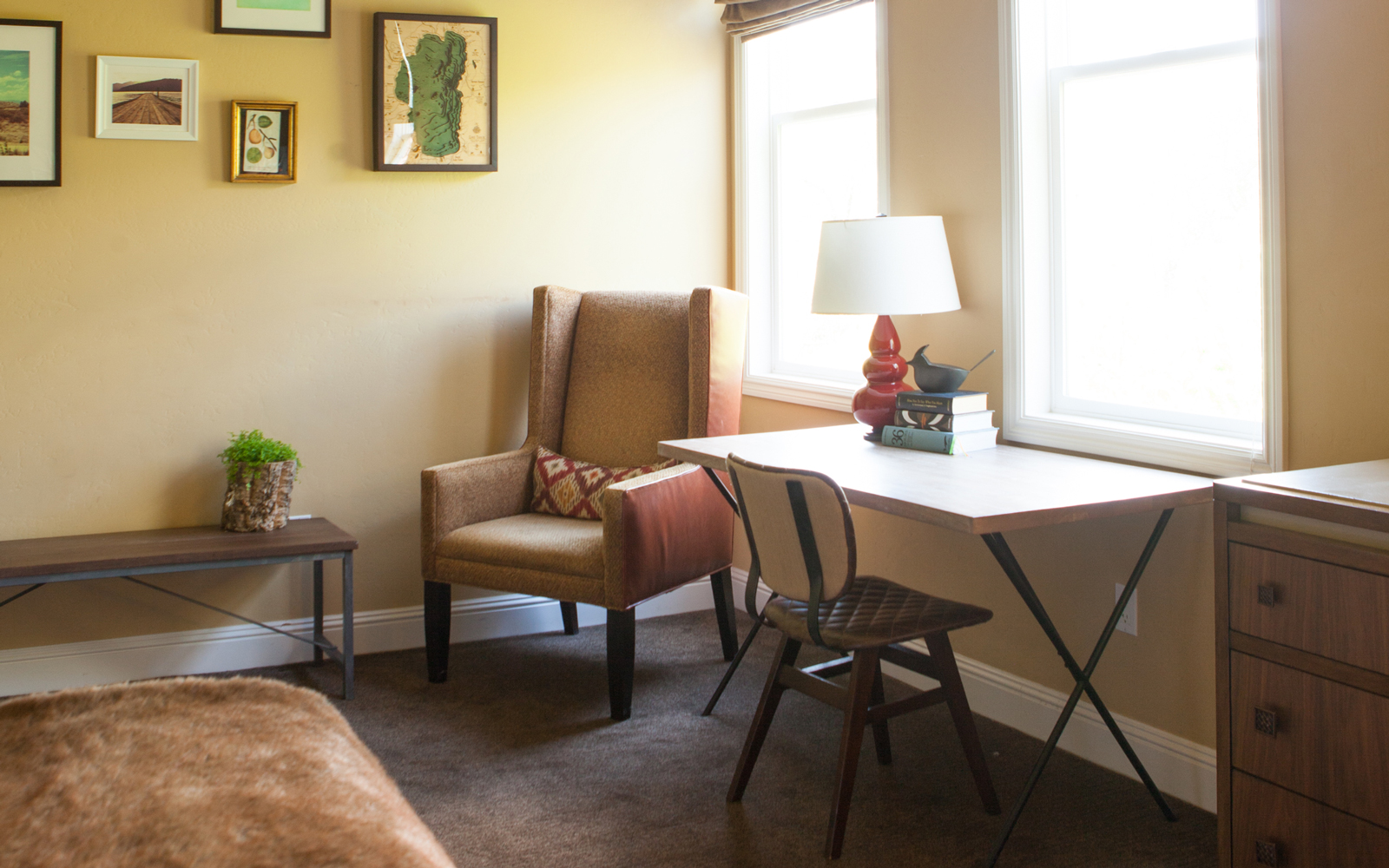 photo of guest room windows, chairs, desk