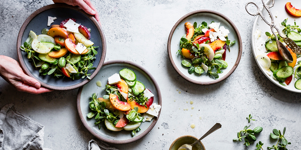 Crisp Kitchen and Juice green salad with peaches